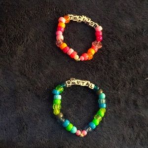Olivia Rodrigo themed kandi. Songs “brutal” and “traitor”